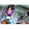 At the university/college - Students rushing up and down a busy stairway - confident pretty young female student looking upwards