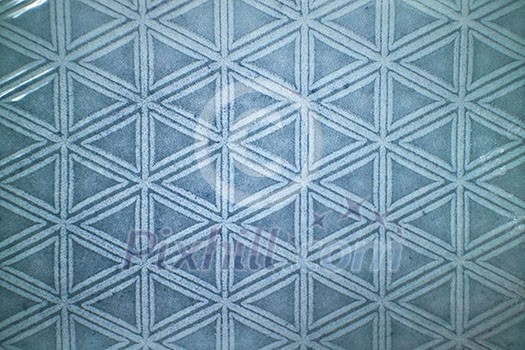 Decorative ceramic blue tile with figured pattern.Can used for design or background Decorative ceramic blue tile with figured pattern.Can used for design or background