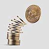 Gold coin bitcoin, springs from coins jumping on a gray background. Cryptocurrency and blockchain trading concept. Volatile currency marketCryptocurrency and blockchain trading concept. Volatile currency market