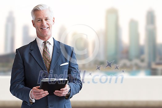 Portrait of senior businessman in front of the big city Portrait of senior businessman in front of the big city