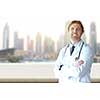 Portrait of senior doctor in hospital room