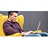 Young Entrepreneur Freelancer Working Using A Laptop And In Coworking space