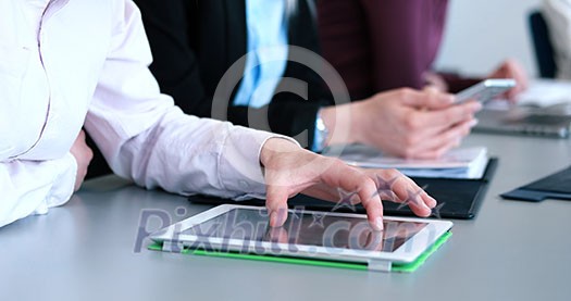 business people having meeting in bright office making plans for business business people having meeting in bright office making plans for business