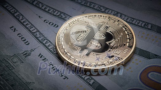 Golden bitcoin coins on a paper dollars money. Virtual Crypto currency. New virtual money Dollars money. Concept of shadow economy Golden bitcoin coins on a paper dollars money. Virtual Crypto currency. New virtual money Dollars money. Concept of shadow economy