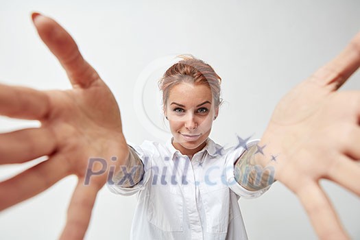 Cute red-haired woman with open arms. Gesture of welcome Cute red-haired woman with open arms. Gesture of welcome