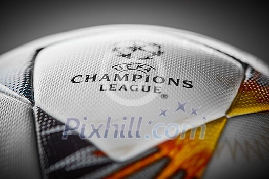 Kiev, Ukraine - February 22, 2018: The upper part of the Official Ball Adidas with Ukrainian symbols for the final of the Champions League on a gray background, there is the inscription final of the Champions League 2017-2018 will be held in Kiev on May 26. Kiev, Ukraine - February 22, 2018: The upper part of the Official Ball Adidas with Ukrainian symbols for the final of the Champions League on a gray background, there is the inscription final of the Champions League 2017-2018 will be held in Kiev on May 26.