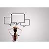 Rear view of businesswoman and speech bubbles above head