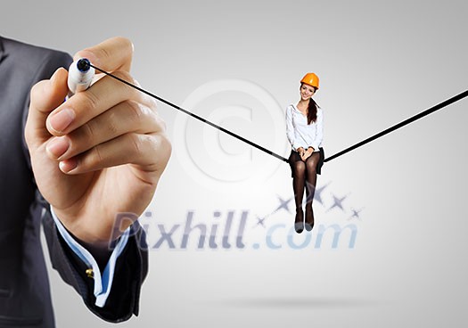 Attractive woman engineer sitting on drawn line Attractive woman engineer sitting on drawn line