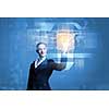 Attractive businesswoman touching icon of media screen