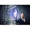 Attractive businesswoman touching icon of media screen