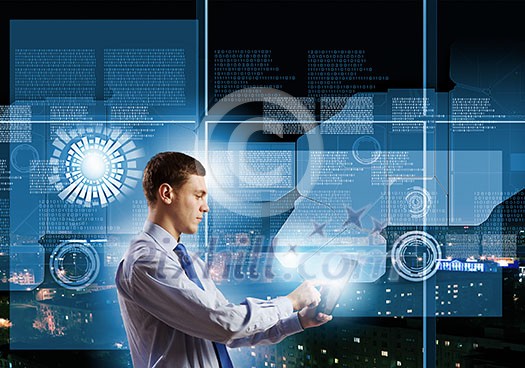 Young businessman with tablet in hands against digital background Young businessman with tablet in hands against digital background