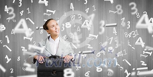 Young pretty businesswoman sitting with briefcase in hands Young pretty businesswoman sitting with briefcase in hands