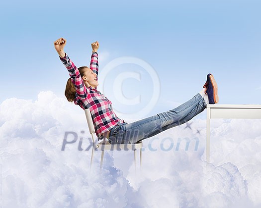 Young woman in casual with arms up celebrating success Young woman in casual with arms up celebrating success