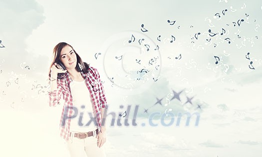 Young pretty girl in casual wearing headphones Young pretty girl in casual wearing headphones