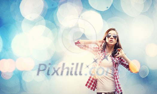 Young pretty girl in casual wearing headphones Young pretty girl in casual wearing headphones