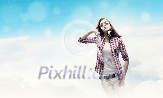Young pretty girl in casual wearing headphones Young pretty girl in casual wearing headphones