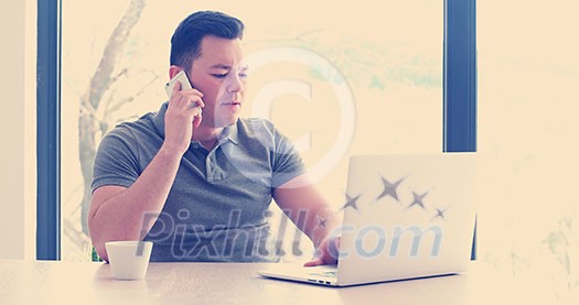 Young Entrepreneur Freelancer Working Using A Laptop In Coworking space Young Entrepreneur Freelancer Working Using A Laptop In Coworking space