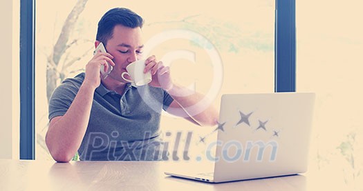 Young Entrepreneur Freelancer Working Using A Laptop In Coworking space Young Entrepreneur Freelancer Working Using A Laptop In Coworking space