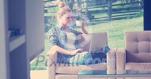 Real Woman Using laptop At Home Drinking Coffee Enjoying Relaxing Real Woman Using laptop At Home Drinking Coffee Enjoying Relaxing