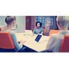 Group of a young business people discussing business plan at modern startup office building