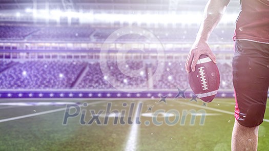 Closeup Portrait of a strong muscular American Football Player on big modern stadium field with lights and flares Closeup Portrait of a strong muscular American Football Player on big modern stadium field with lights and flares