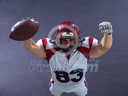 american football player celebrating touchdown isolated on gray background american football player celebrating touchdown isolated on gray background