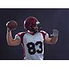 one quarterback american football player throwing ball isolated on gray background