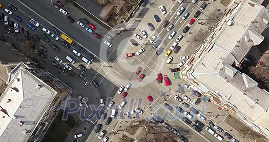 Overhead view of intersection of streets in Kiev with cars, taxis, bus and people from above . High traffic on the streets of the big city of Kiev, Ukraine. Drone video in 4K Overhead view of intersection of streets in Kiev with cars, taxis, bus and people from above . High traffic on the streets of the big city of Kiev, Ukraine. Drone video in 4K