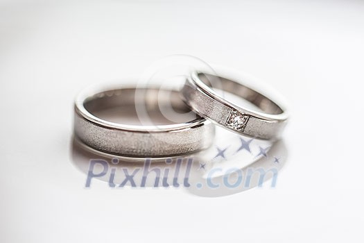 Two splendid wedding rings on a wedding day. Two splendid wedding rings on a wedding day.