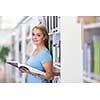 Pretty, female student in a library