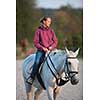 Horseback rider, woman riding a horse