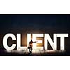 Back view of businessman standing in light of word client