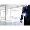 Close view of elegant businessman against modern ofiice window