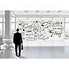 Back view of elegant businessman against banner with business strategy plan