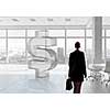Elegant businesswoman in modern office interior against window panoramic view