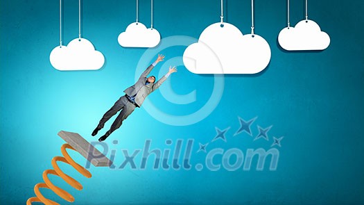 Businessman jumping on springboard as progress concept Businessman jumping on springboard as progress concept