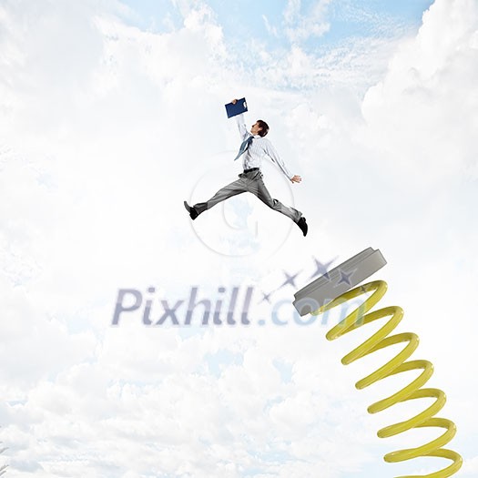 Businessman jumping on springboard as progress concept Businessman jumping on springboard as progress concept