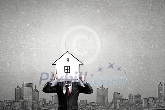 Unrecognizable businesswman holding paper sheet covering his face Unrecognizable businesswman holding paper sheet covering his face
