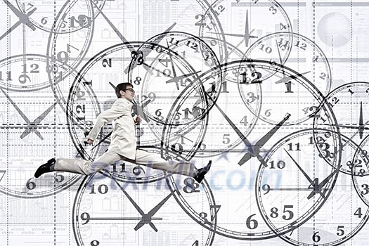 Concept of time with funny businessman running in a hurry Concept of time with funny businessman running in a hurry