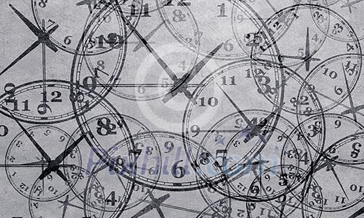 Many round wall clocks on grey concrete wall Many round wall clocks on grey concrete wall