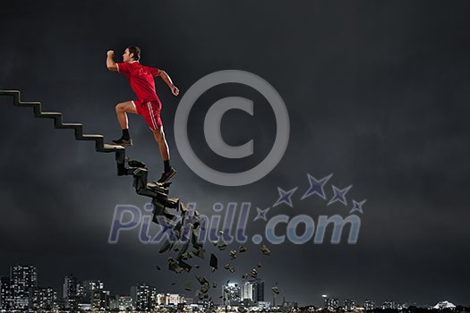 Sports active man running on stone collapsing ladder Sports active man running on stone collapsing ladder