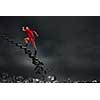 Sports active man running on stone collapsing ladder