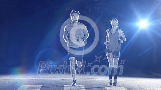 group of healthy people jogging in city park, runners team at night training group of healthy people jogging in city park, runners team at night training
