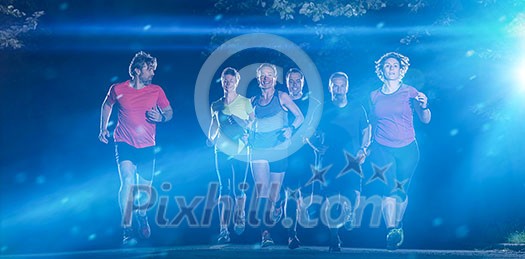 group of healthy people jogging in city park, runners team at night training group of healthy people jogging in city park, runners team at night training