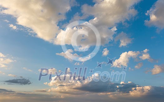 Beautiful background with clouds and blue sky in a sunny summer day. Photo from the drone. Beautiful background with clouds and blue sky in a sunny summer day. Photo from the drone.