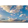 Beautiful background with clouds and blue sky in a sunny summer day. Photo from the drone.