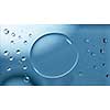 Transparent water drops with shadow on blue gradient background