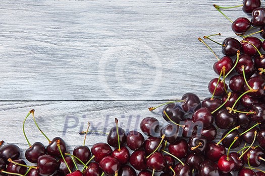 Freshly picked natural organic berries background with copy space. Concept of healthy clean eating. Freshly picked natural organic berries background with copy space. Concept of healthy clean eating.