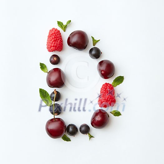 Letter D english alphabet in the form of a pattern of natural organic berries - ripe fresh raspberry, black currant, cherry, green mint leaf isolated on a white background. Top view. Letter D english alphabet in the form of a pattern of natural organic berries - ripe fresh raspberry, black currant, cherry, green mint leaf isolated on a white background. Top view.