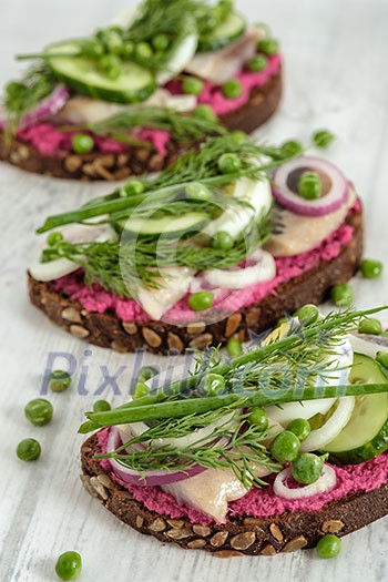 Sandwich with herring, horseradish and fresh herbs Sandwich with herring, horseradish and fresh herbs